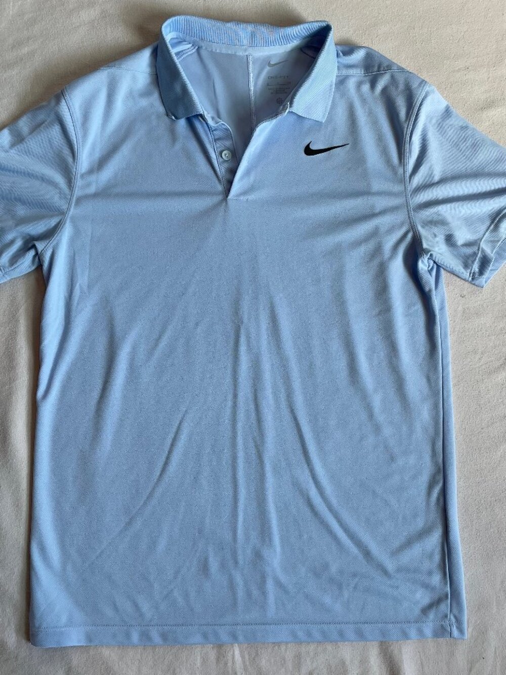 Nike Light Blue Polo Shirt with Black Swoosh